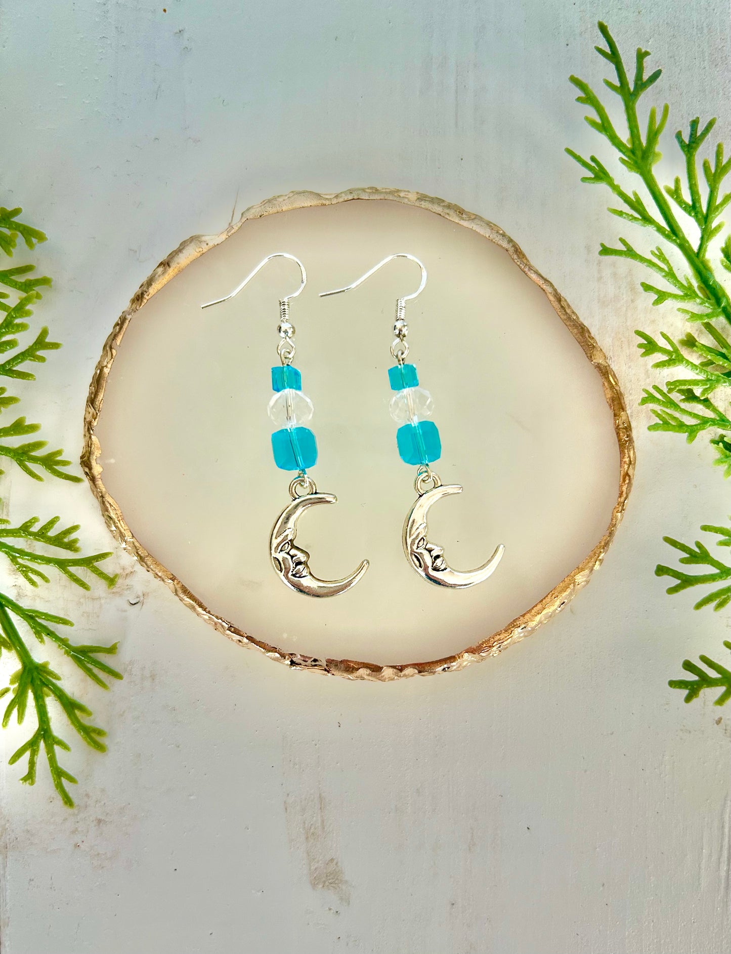 Dangle moon earrings w/ blue & clear gemstones