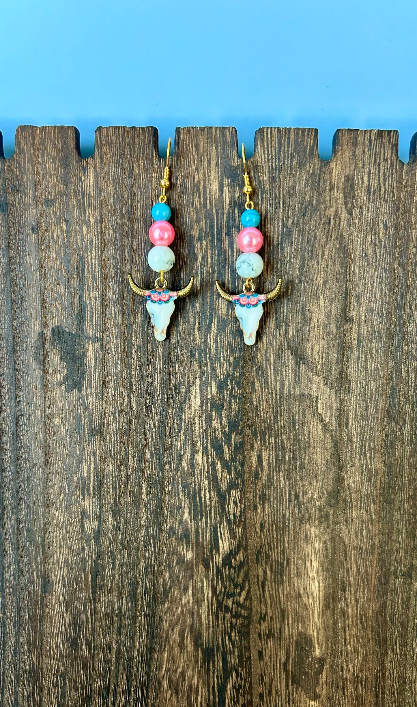 Bull head dangle earrings