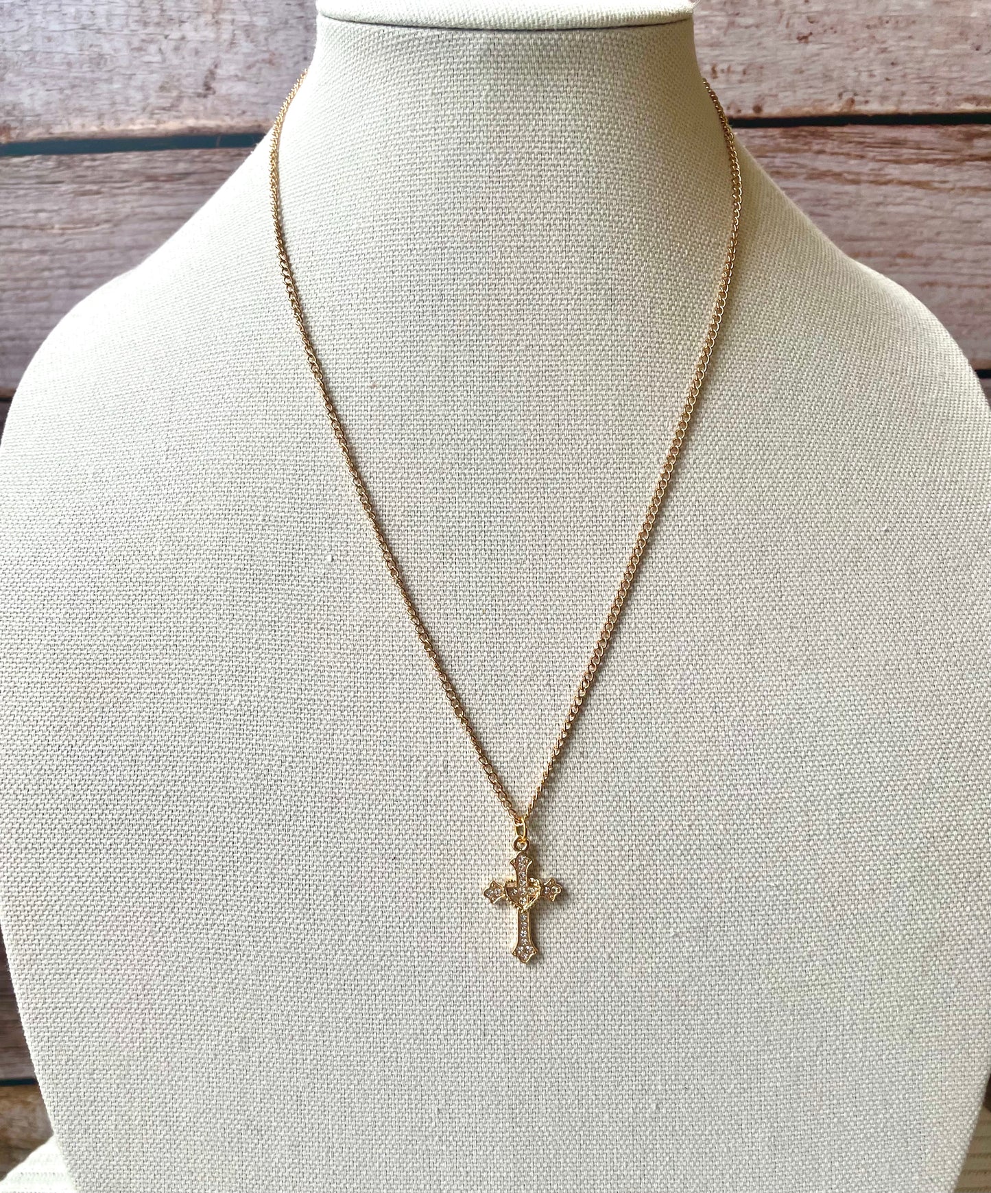 Heart wrapped cross necklace