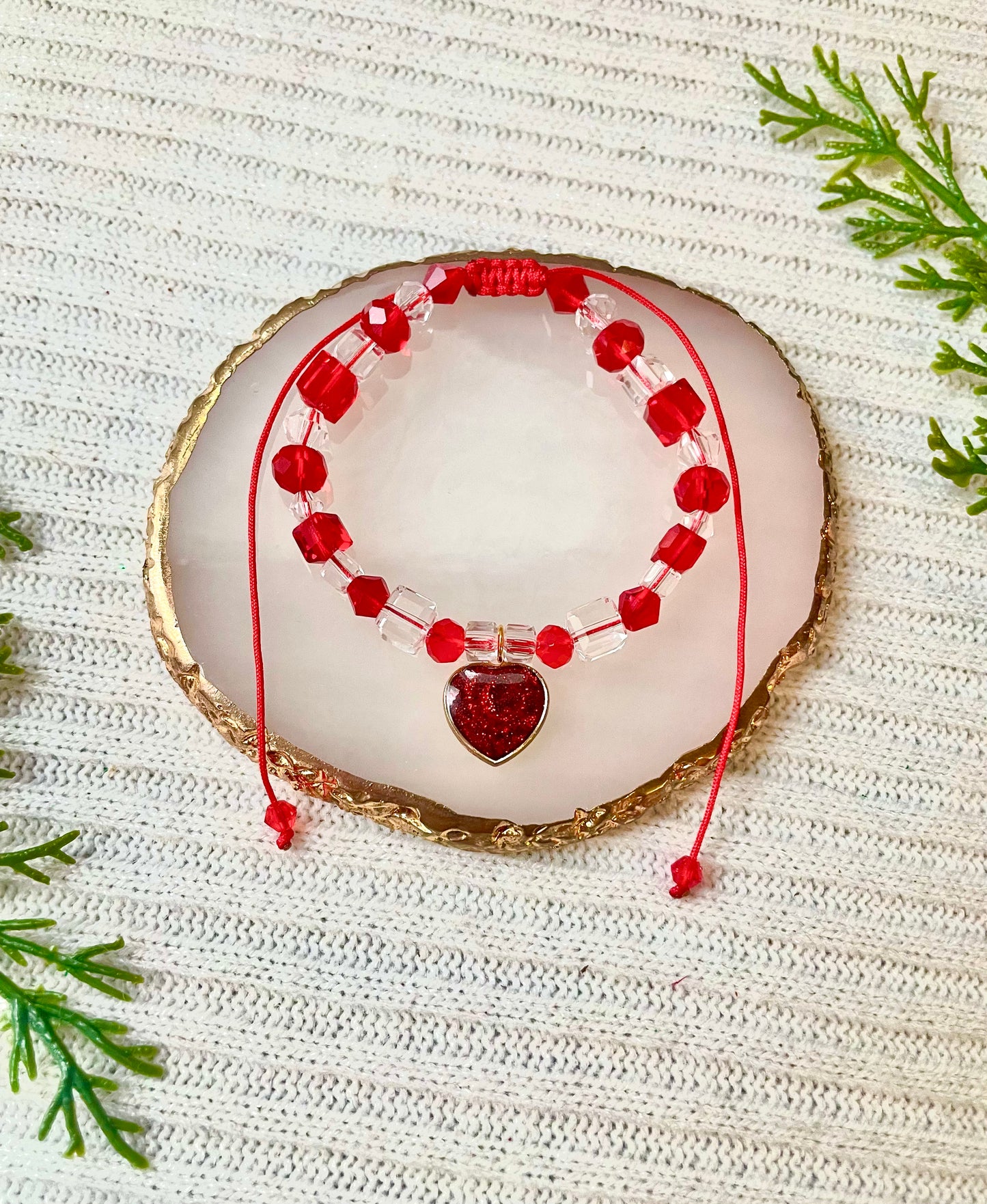 red glitter heart adjustable knotted bracelet